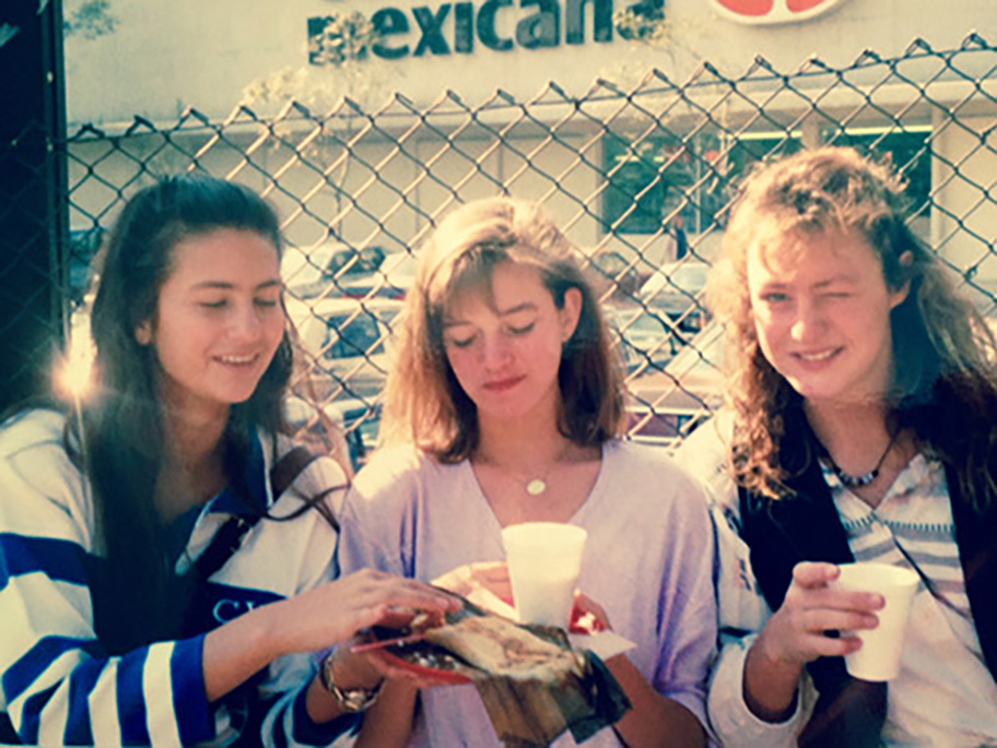 Pati eating tamales with her school friends