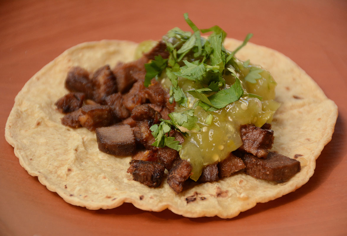 tacos de lengua with salsa and cilantro